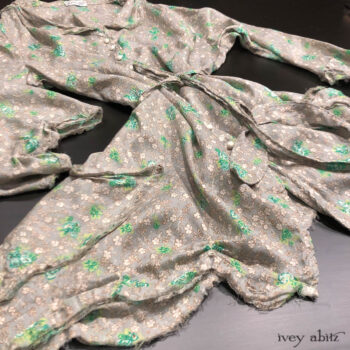 Au Sable Shirt Jacket in New Day Floral Cotton Voile. Adorned with antique wooden composition buttons, circa early 1900's.