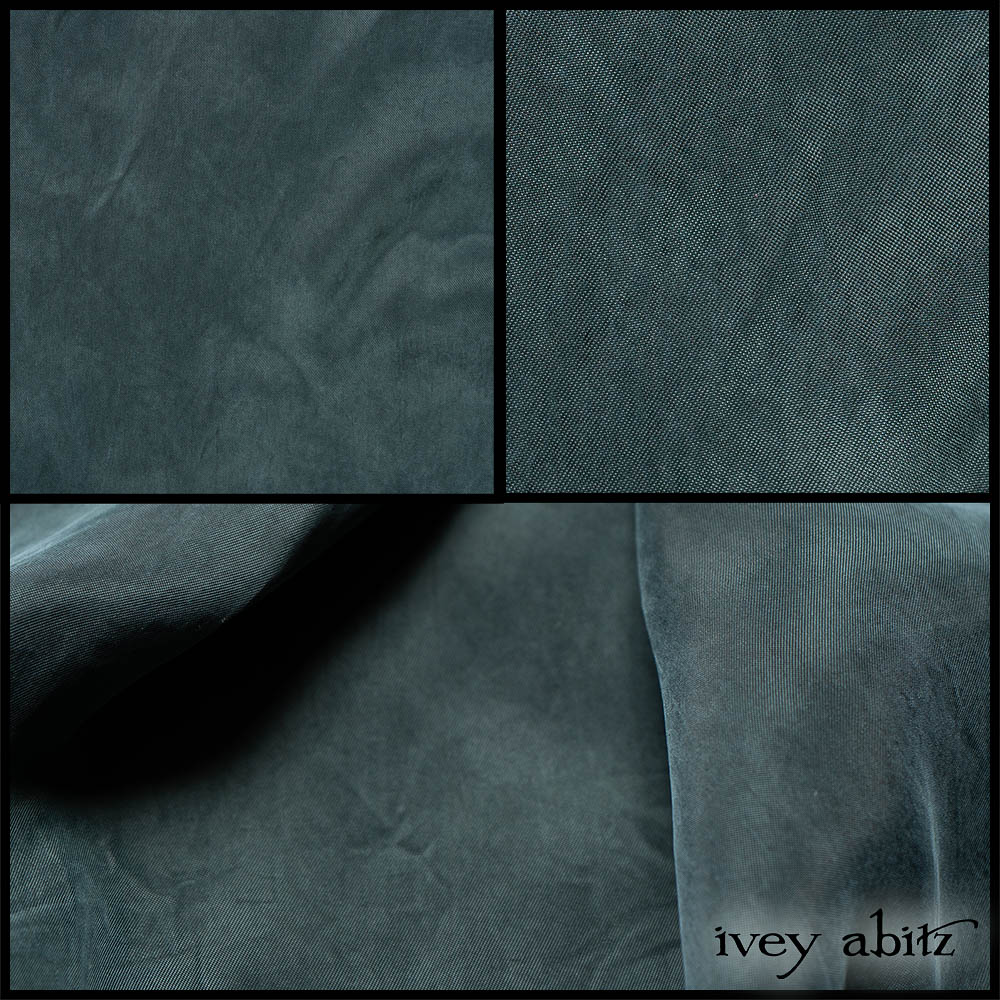 Description: A rich and ambiguous blue that echoes the depth of the Hudson Valley sky was challenging to find. But find it we did! A sueded feel and look. Drapey and fluid wonderfulness. Opaque but it still breathes. It is woven to look like a silk charmeuse, but it is created with bamboo instead. Some call this vegan silk. We call it a must-have. Ideal for base layer frocks, shirts, flowy trousers. Content: Fine bamboo threads that look like silk. Woven in Italy. Three season weave. Care: Simply hand wash or put through machine delicate cycle in cold water with a plant based detergent. We suggest using a natural fabric softener to maintain the softness we have washed into it. Tumble dry on extra-low heat for just a few minutes with our artisan wool dryer balls to keep the relaxed effect that is featured in the Look Book.