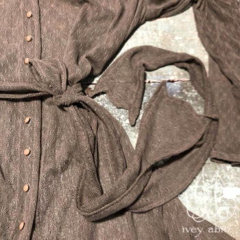 Fairholme Jacket in Flora Netted Lace, adorned with antique wooden composition buttons, circa early 1900's.