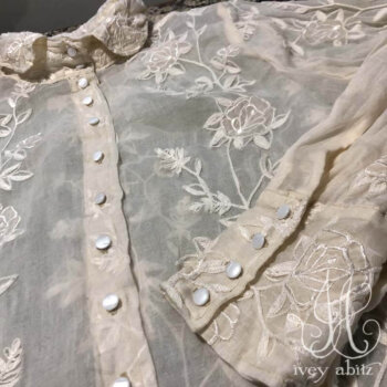 Truitt Shirt in Gardenia Crewel Work on Organdy, adorned with antique glass buttons, circa early 1900's.