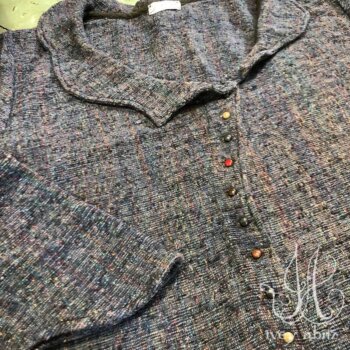 Chevallier Duster Coat in Bouquet Old World Weave, adorned with antique buttons, circa early 1900&rsquo;s.