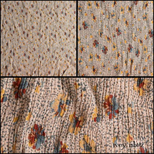 Description: This is a floral take on Cape Cod's palette and infinite beauty. A splash of yellow is necessary for an undeniable hue of happy. It is contrasted with calming blues and earthy rusts. The background is a nod to the classic spatter paint floors that are ubiquitous in historic Cape Cod homes. Because of the texture in the crinkled effect, this lovely silk fabric has a bit of give to it. It will give you some leeway in terms of fit, and garment measurements are approximate because of it. If you'd like your layering frock to hug your body (as opposed to a more relaxed drape) consider ordering one size down from your normal size. Otherwise, embrace the relaxed drape to ensure stress is not placed on seams and order in your normal IA size. Order a size up for a truly ethereal and relaxed drape. Content: 100 percent silk, woven in Italy. All season weave. Care: Simply hand wash or put through machine delicate cycle in cold water with a plant based detergent. We suggest using a natural fabric softener to maintain the softness we have washed into it. Tumble dry on extra-low heat with our artisan wool dryer balls to keep the relaxed effect that is featured in the Look Book. You can easily change the drape and fit by spritzing the weave with water and reshaping the silk chiffon. It is very forgiving and wonderful.