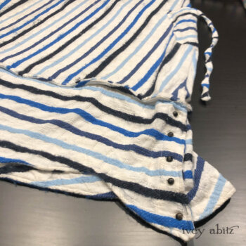 Harrison Frock in one of the cleverest stripe weaves.