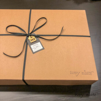 We send all of our garments carefully folded and housed in boxes to keep them safe and sound during their exciting journey to their new home. This box is headed to Australia!