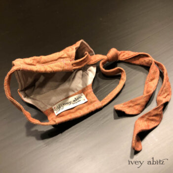 Bespoke mask to complement a client's new wardrobe.