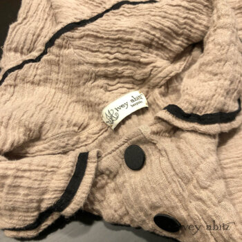 Monceau Duster Coat collar detail. Adorned with antique silk woven buttons, Parisian, circa 1904.