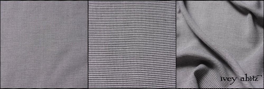 Everyday Grey Houndstooth - Description: The threads are splendidly spun so that this lovely weave has heft without weight. It is opaque and sturdy, but it is not heavy like a coat weight weave. It’s perfect for shirts, frocks, skirts, and trousers. The drape is graceful, flowing, and spot on for everyday wear. Content: Cotton and viscose weave. Care: Simply hand wash or put through machine delicate cycle in cold water with a plant based detergent. We suggest using a natural fabric softener to maintain the softness we have washed into it. Tumble dry on extra-low heat with our artisan wool dryer balls to keep the relaxed effect that is featured in the Look Book.