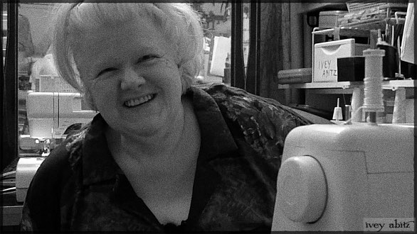 Ivey Abitz Master Seamstress, Kaye, in her sewing studio.