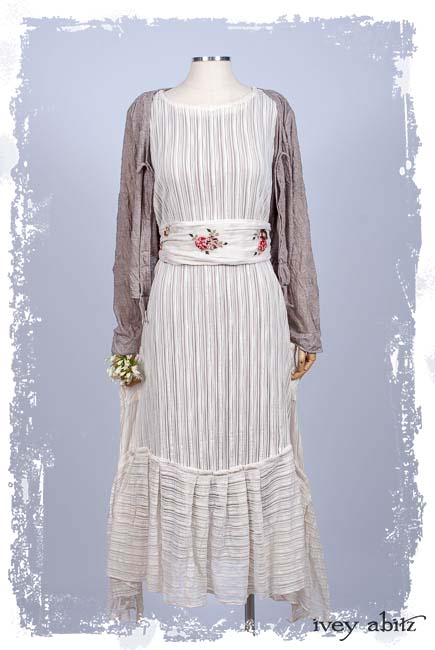 Look 74: Chevallier Cardigan in Taupe Rose Crushed Knit; Fairholme Sash in Floral Embroidered Velvet-on-Voile; Fairholme Frock in Gardenia Variegated Stripe Weave; Cilla Slip Frock in Rose Silk Knit. Spring Summer 2019