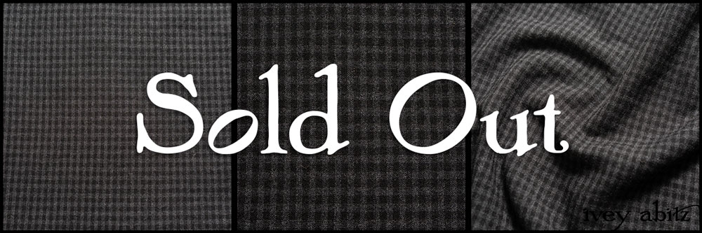 Description: A subtle and small checked design, created by refined and strong threads of wool, all expertly woven together. Very smooth to the touch with a matte finish. Alternates flawlessly between our Midnight Train (black) and Rail (charcoal) hues. Content: Washed and softened lightweight wool. Three season weave. Care: Simply hand wash or put through machine delicate cycle in cold water with a plant based detergent. We suggest using a natural fabric softener to maintain the softness we have washed into it. Tumble dry on extra-low heat with our artisan wool dryer balls, just for a few minutes, to keep the relaxed effect that is featured in the Look Book.