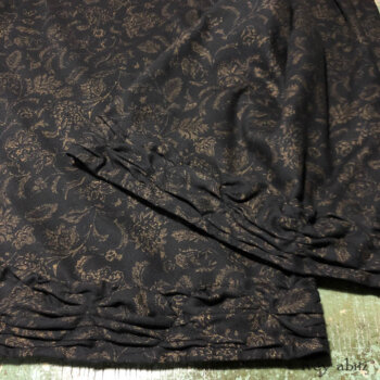 Bottom hem detail of Bartholomew Trousers in a fablous floral weave.