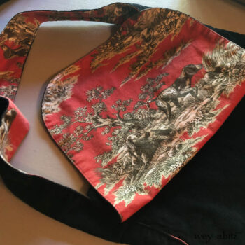 Inside view of a beloved Solomon Bag, featuring the Dogs in the Woodland lining.