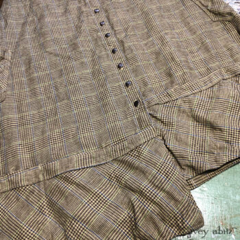 Close-up of the Porte Cochere Frock's bottom hem.