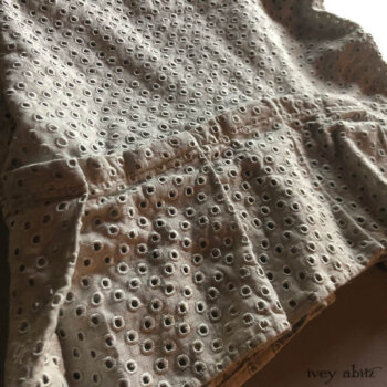 Bottom hem detail of the Inglenook Frock in an embroidered linen.
