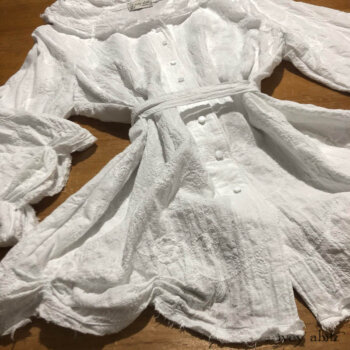 Celia Shirt in a stunning embroidered cotton. Adorned with antique glass buttons.