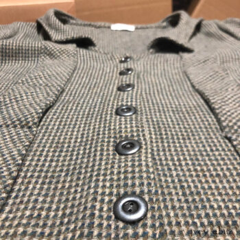 Vanetten Duter Coat in a smart houndstooth. Adorned with vintage Italian buttons.