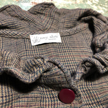 Detail photograph of a Grasmere Vest in a plaid silk.