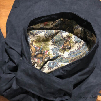 Detailed view of one of several Camilla Raincoats made this season in our new waxed cotton.