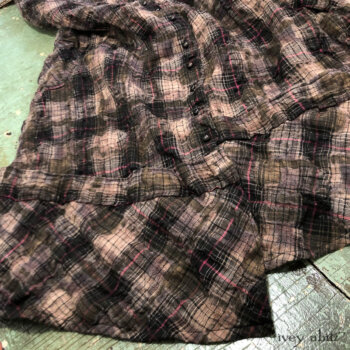 Bottom hem detail of a Porte Cochere Frock.