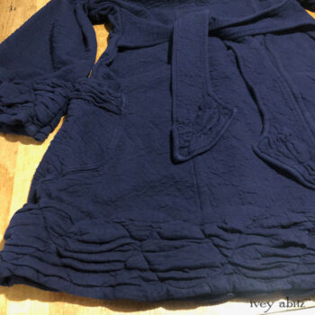 Mewland Jacket, back view, in a crinkled knit.