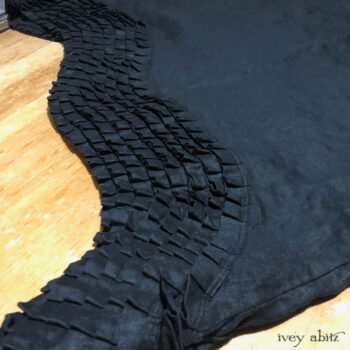 Thatched Frock with spot on and intricate bottom hem pleating.