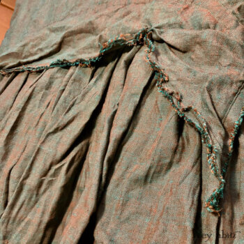 Detailed view of the Ardsleydale Frock in one of our stunning yarn dyed linens.