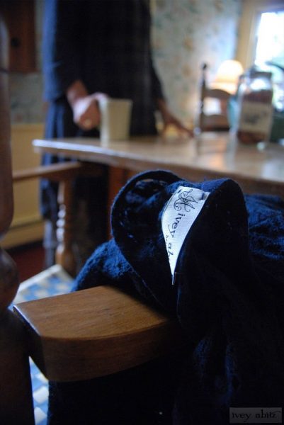An Ivey Abitz dress over a chair at Saturday Farm.