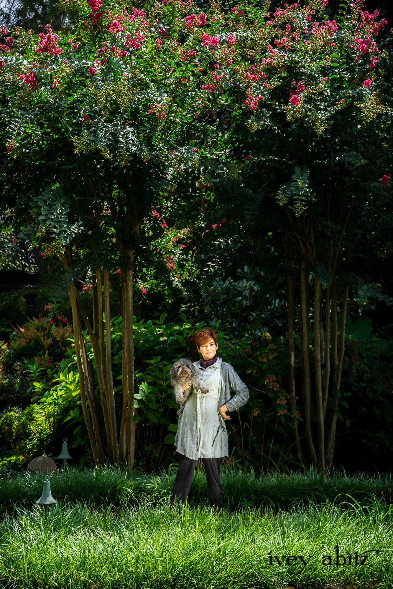 Crownpoint Cardigan in Pewter Best Friend Knit; Crownpoint Vest in Pewter and Pearl Heirloom Knit; Chevallier Shirt in Pewter Open Weave Stripe; Chevallier Trousers in Pewter Woven Diamond Knit. - Bespoke clothing by Ivey Abitz. Featuring Carolyn Hennesy with rescue dogs and cats.