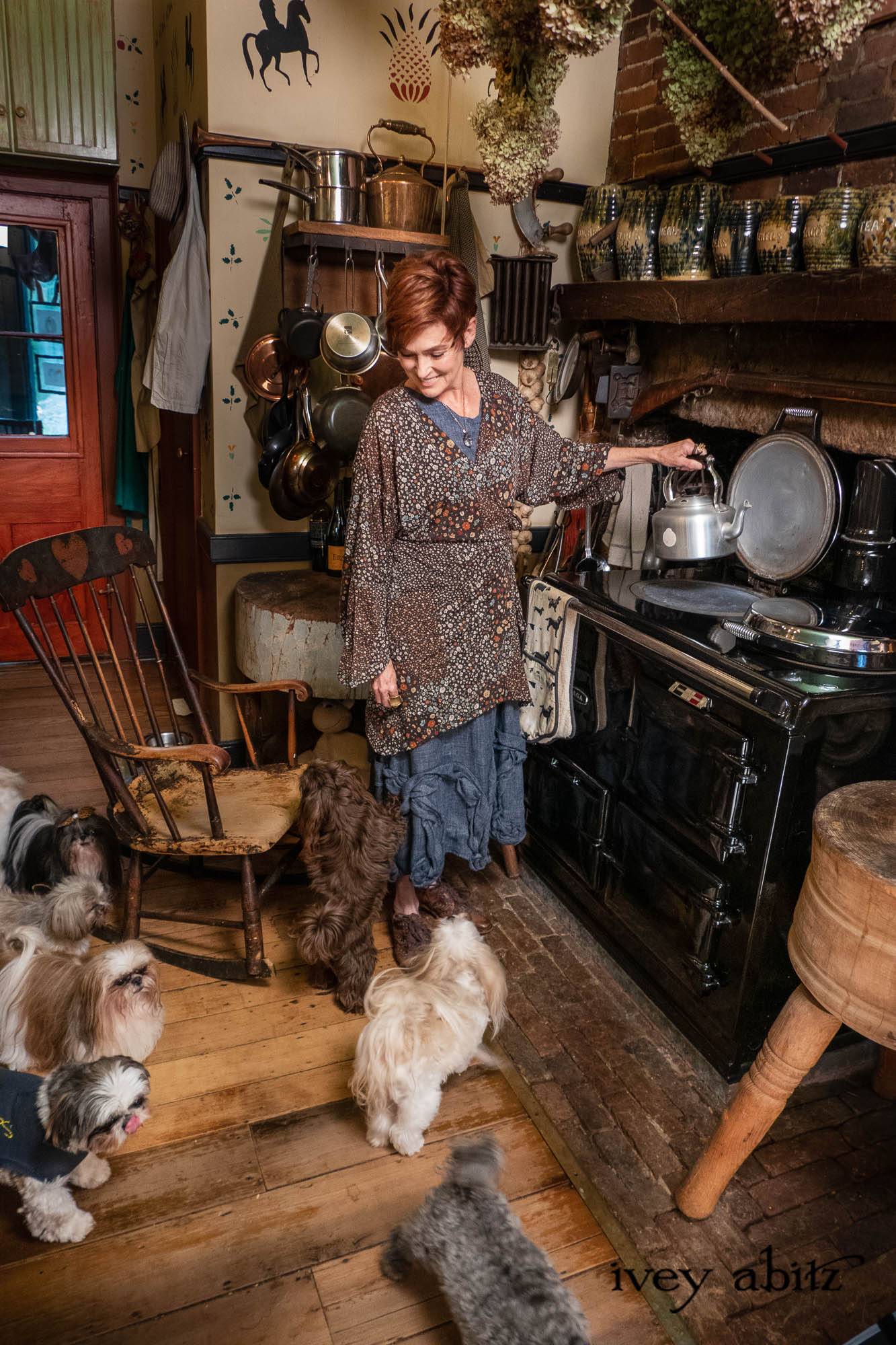 Bartholdi Jacket in Gem Petite Fleur Knit; Bartholdi Frock in Blue Kyanite Washed Woven Weave; Cilla Slip Frock in Signature Black Washed Jersey Knit; Nouvelle Necklace. - Bespoke clothing by Ivey Abitz. Featuring Carolyn Hennesy with rescue dogs and cats.